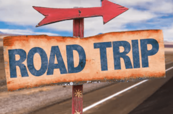 A sign on the side of the street

Description automatically generated